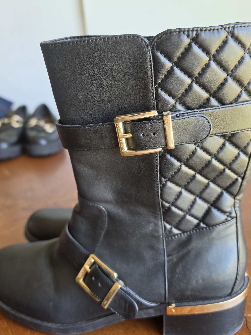 Black Quilted Mid-Calf Heeled Boots with Gold Buckles